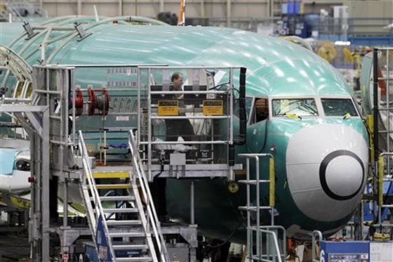 FILE - In this Oct. 26, 2010 file photo, a Boeing Co. 737 airplane is lined up at the company's assembly facility in Renton, Wash. Delta Air Lines on Thursday, Aug. 25, 2011, confirmed its plan to buy 100 Boeing 737 jets as part of a fleet upgrade, with delivery set for 2013 to 2018. (AP Photo/Ted S. Warren, File)